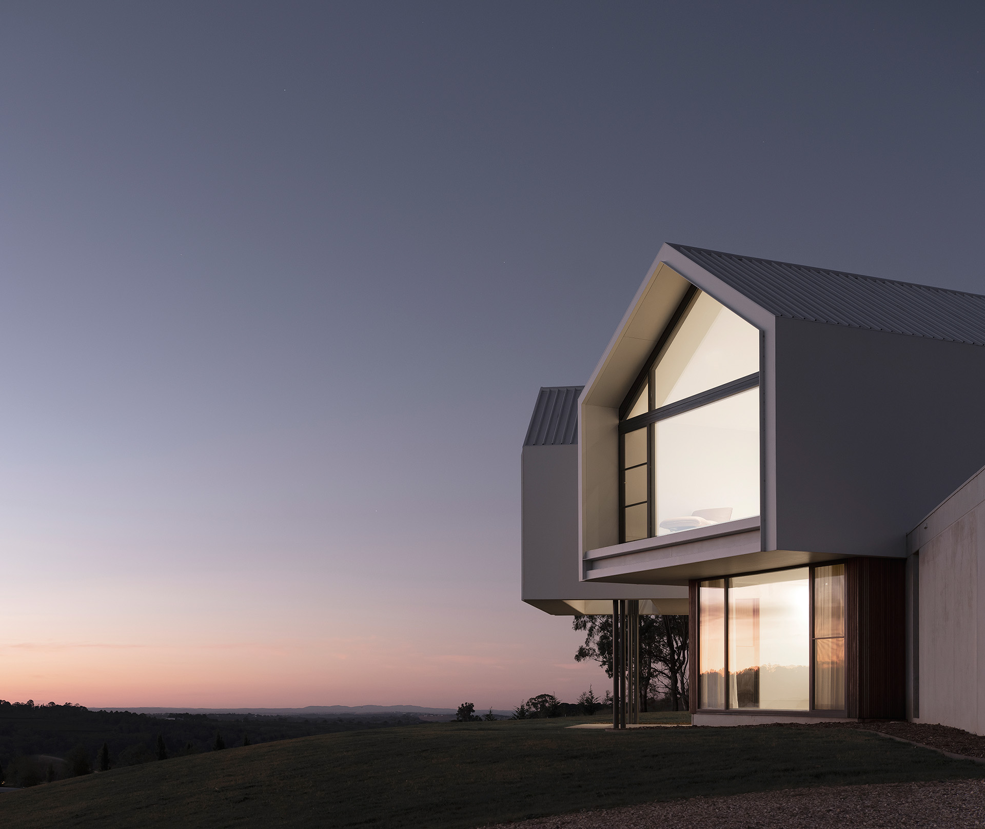 C House by Source Architects, Orange NSW, at dusk